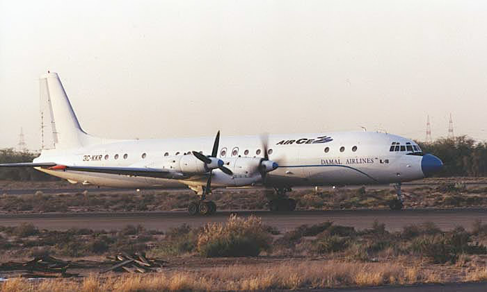 In the fading deset light there comes a Il-18 taxiing...
